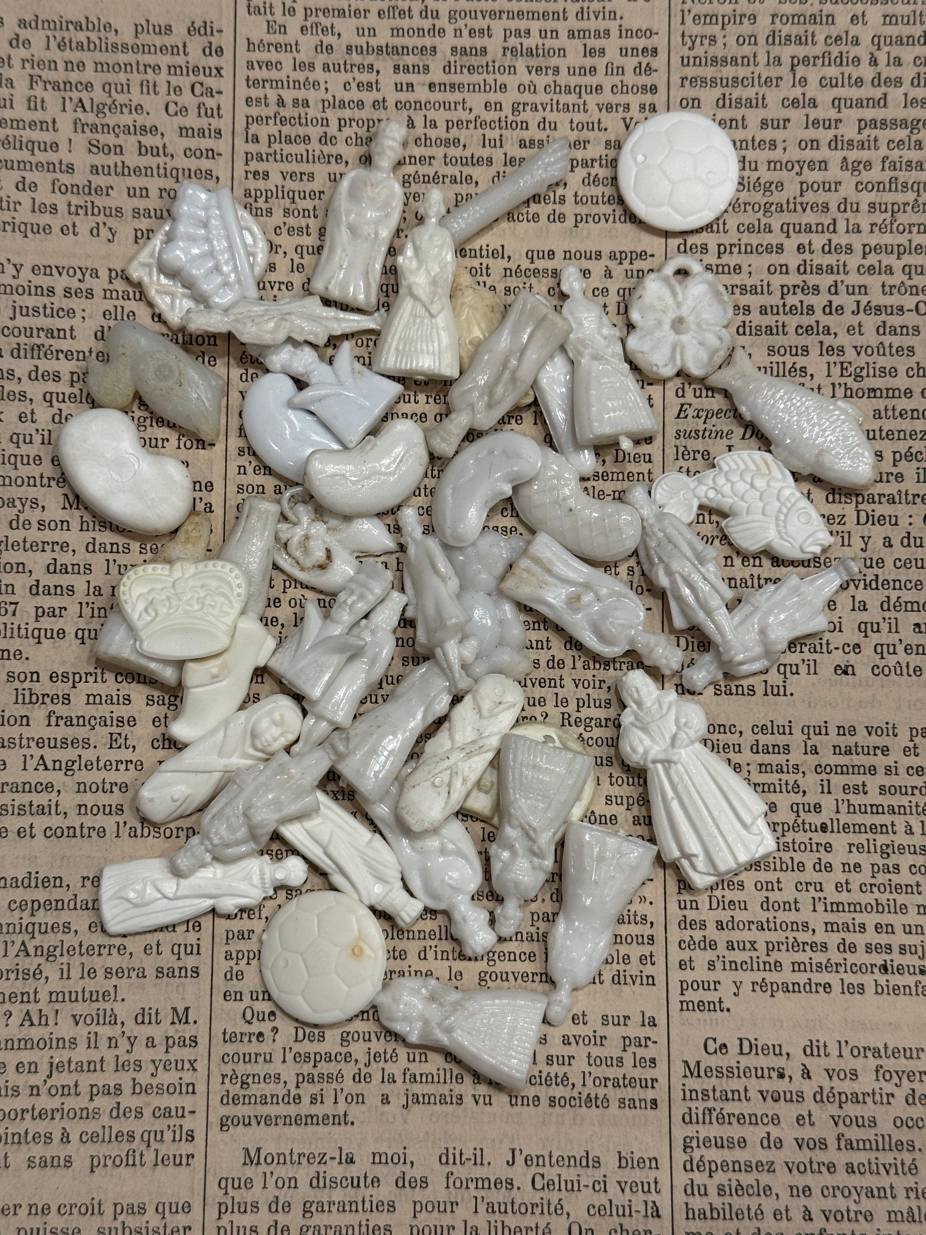 Large Assortment of 50 Plastic Feves