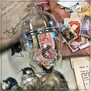 Ephemera Filled Glass Egg with Cord Hanger